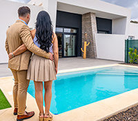 couple standing in the garden of their new luxury 2024 12 09 02 40 17 utc 1