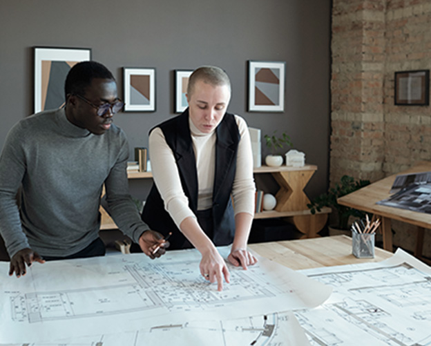 two confident engineers in smart casualwear discus 2025 03 13 04 31 10 utc